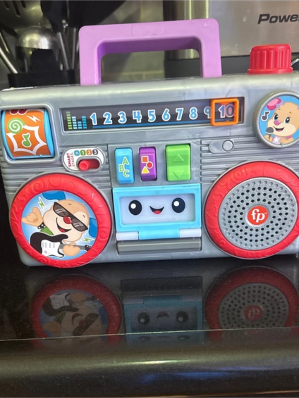 Fisher-Price Gray Boombox Learning Toy with Purple Handle and Red Speakers